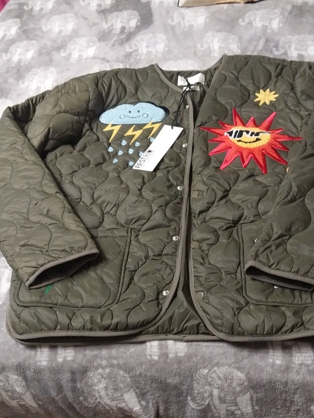Quilted Olive Green Jacket with Playful Patches